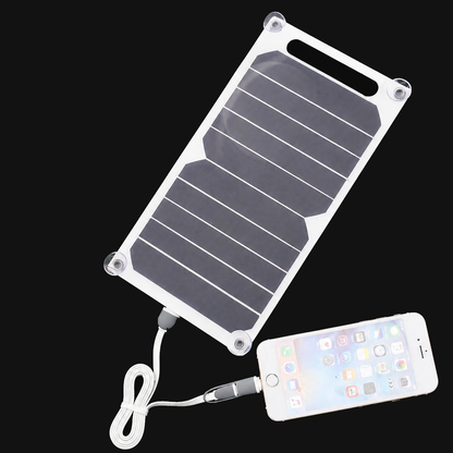 6W portable 5V USB solar panel charging a phone